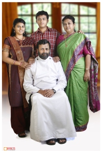 Hello!This is a picture of my family.Love and Prayers.Elizabeth Abraham,India.